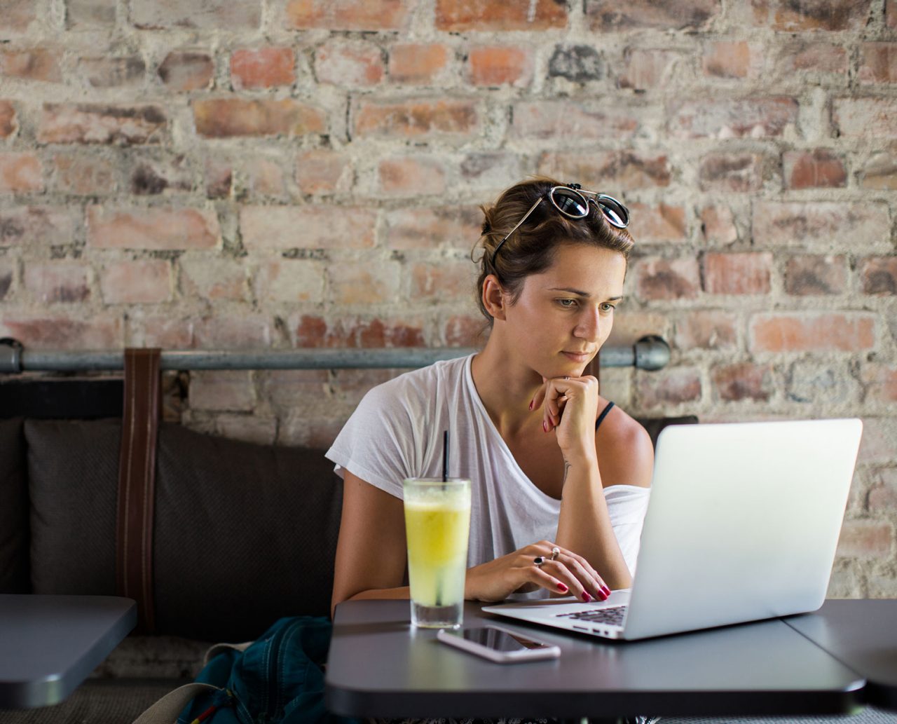 girl in cafe on laptop girl in cafe on laptop